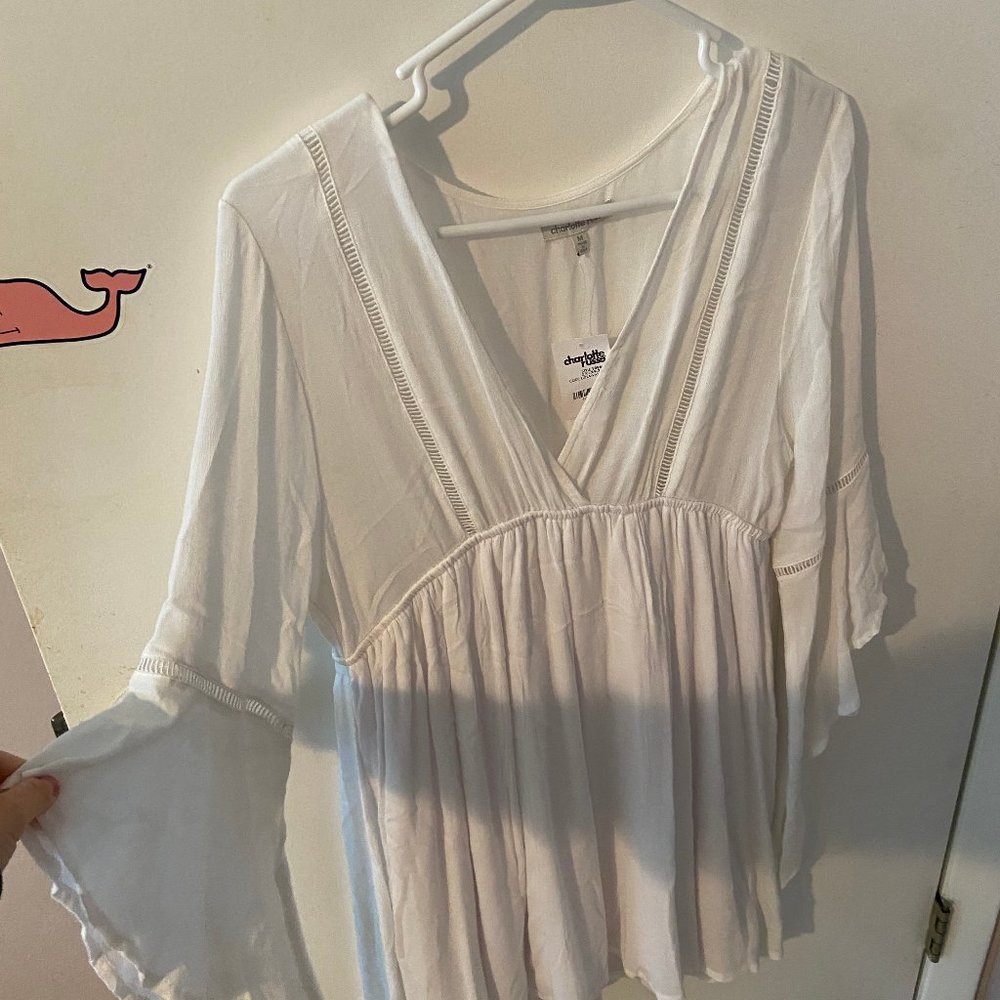 white dress, price tag still on